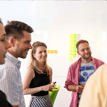 Smiling team of project consultants in an office